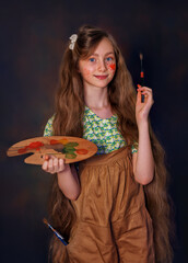 Child girl or artist palette painting at studio, plein air. Talented little artist smiles and prepares to draw on canvas with paint brush. Art preschool, creativity and people concept