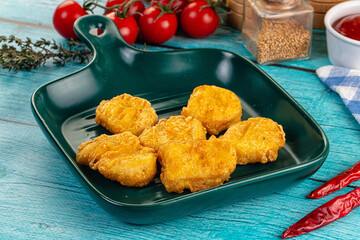 Golden crispy fried chicken nuggets