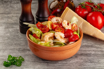 Tasty caesar salad with prawn