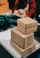 Portrait of Starting small businesses SME owners, two Asian woman check online orders Selling...