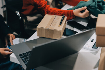 Portrait of Starting small businesses SME owners, two Asian woman check online orders Selling...