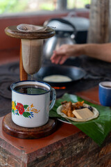 Costa Rican traditional coffee brewing and breakfast setup