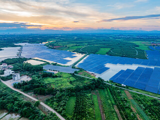 Photovoltaic panels overhead at sunset