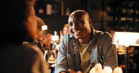 Anniversary, date and smile with couple in restaurant at night for bonding or celebration. Fine...