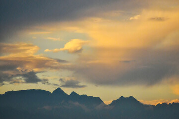 sun ray is go down and amazing dramatic orange cloud in sunset