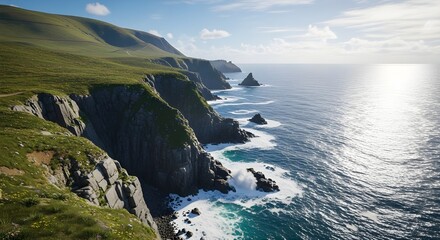 Stunning coastal landscape featuring rugged cliffs, foamy ocean waves, colorful wildflowers, rolling green hills, and a clear blue sky under bright daylight.