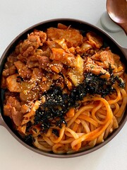 Classic spaghetti coated in rich tomato sauce, offering a simple yet delicious combination of...