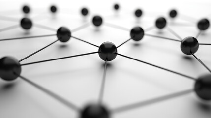 Abstract network of interconnected black spheres on white background.