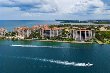 Aerial view of boats on turquoise waters in Miami. Yacht retreat in Miami. Oceanfront cityscape...