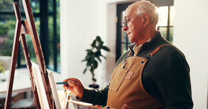 Elderly man, painting and canvas at house for art, drawing process and sketch for artwork. Artist, senior person and easel with creative design, creating craft and unique piece for retirement hobby