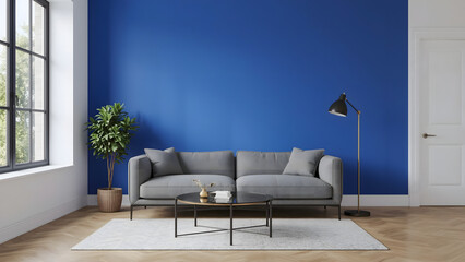 Modern living room interior featuring a gray sofa, blue wall, and decorative elements.