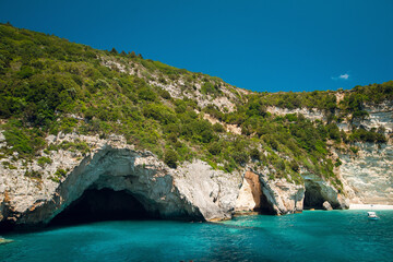 Coastal Landscape with Caves and Turquoise Waters