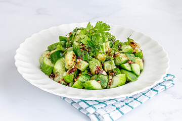 Smashed Cucumber Salad with Spicy Dressing Close-Up Healthy Food Photo
