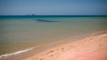 Serene Beach with Golden Sand and Turquoise Water