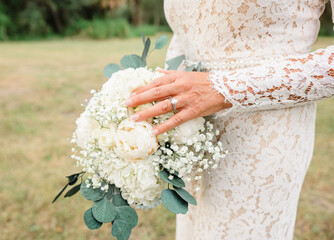 Bride Holding Floral Bouquet with Engagement Ring in Punta Gorda