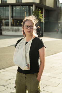 Plaster cast. Teenager with fractured arm, broken wrist bones