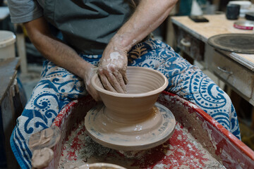 Artist in Ceramics and Pottery Studio working