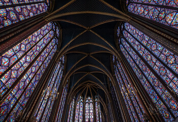 Stained glass windows inside Sainte Chapelle chapel in Paris, France.