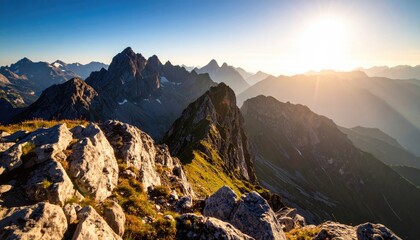 Mountain peaks bathed in golden sunrise light