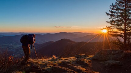 Sunrise mountain vista with photographer.