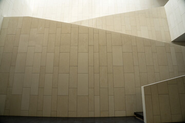 The interior public space design of modern museums reflects a sense of spaciousness and the texture of materials