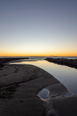 Obraz premium image of the mouth of the river in the mediterranean sea at dawn