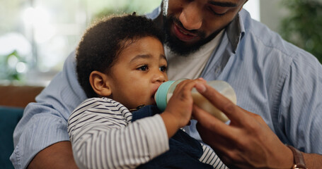 Home, father and baby with bottle, feeding and bonding together with nap time, wellness and care....