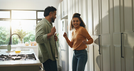 Love, happy couple and dance in kitchen for celebration, anniversary and romance. Energy, man and...