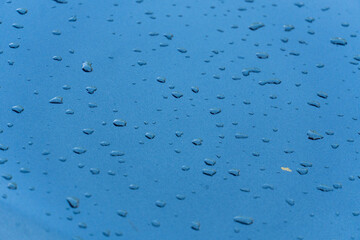 group of water drops on metallized paint