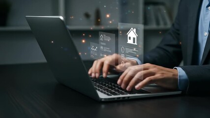 Businessman typing on a laptop, analyzing real estate data with holographic interface displaying house icon and charts - Powered by Adobe