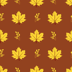 Seamless pattern with maple leaves on a brown background