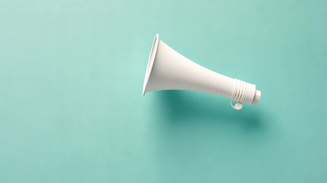 White megaphone on a mint green background
