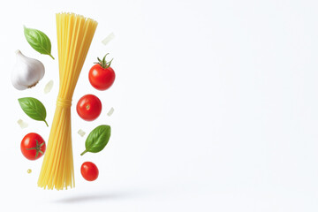 Bundle of uncooked spaghetti is surrounded by fresh tomatoes, garlic, and basil leaves, creating vibrant and appetizing composition on white background with copy space