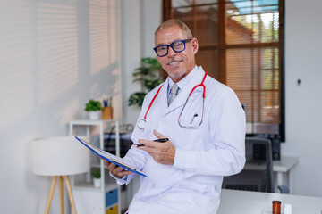 healthcare, Mala doctor character holds clipboard and standing in workplace.Professional...