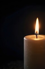 A single candle burning in complete darkness, soft flickering flame creating gentle light halos, concept of hope in darkness, solitude, peace, photorealistic,Generative Ai
