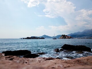 A drone photo of the bay of Sveti Stefan and the island of Sveti Stefan in Montenegro in the...