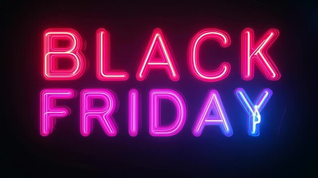 A neon sign that says Black Friday. The sign is pink and blue. It is lit up and is on a dark background