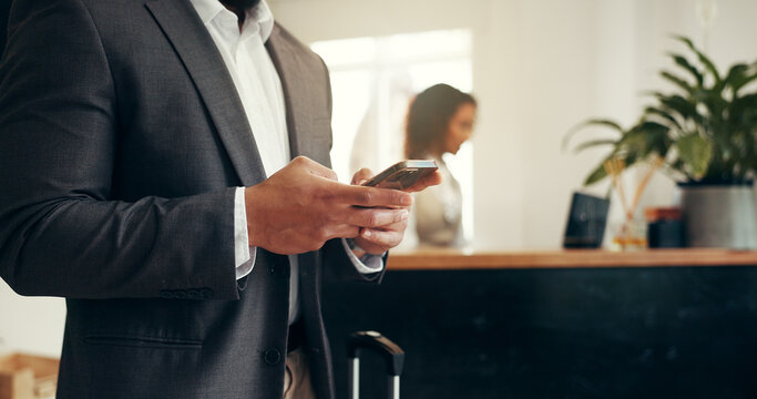 Hotel, luggage or hands of businessman with phone for online checkin, check booking or reservation. Professional, guest and smartphone in lobby for conference schedule, chat and email travel agency