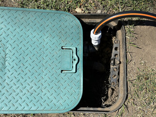 Water tap and plastic pipe outdoor
