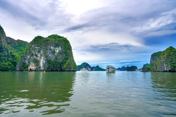 Amazing view of geological wonders of limestone islands in Halong bay in summer, Quang Ninh, Vietnam