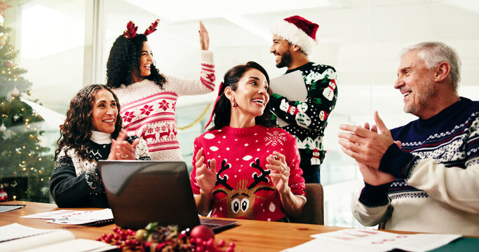 Christmas, colleagues and applause in boardroom, celebration or high five for sales, graph or chart. Team, meeting and people with smile for financial growth, clapping or holiday success for business