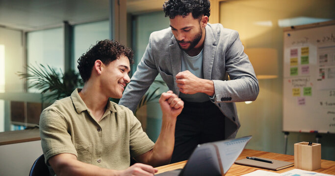 Happy, businessmen or night with fist bump or laptop for project deadline or success in office. Male people, colleagues or analyst working late with touch, smile or computer for good job or well done