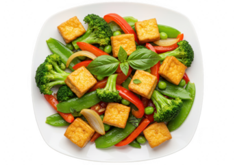 A vibrant stirfry of golden tofu cubes with broccoli, bell peppers, snow peas, and onion, garnished with basil isolated on transparent background