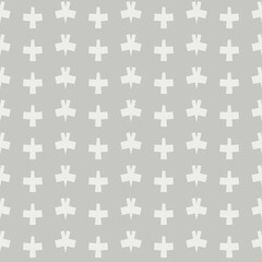 A repeating pattern features white geometric shapes arranged symmetrically against a light gray background. The design creates a subtle, modern look with its simple and uniform layout.