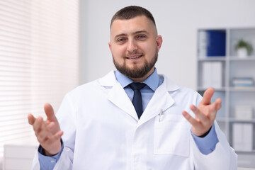 Portrait of doctor in uniform in clinic