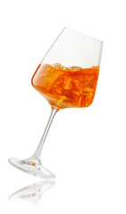 aperol spritz cocktail in falling glass isolated on white background