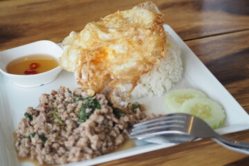 Authentic Thai Basil Pork: A Flavorful Fried Egg Delight.