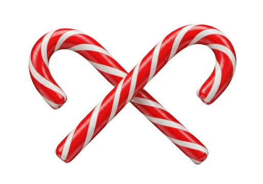 Two red and white striped candy canes are crossed in a festive holiday display isolated on transparent background