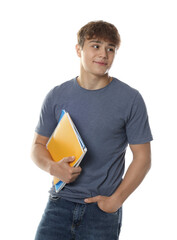 Cute teenage boy with notebooks on white background