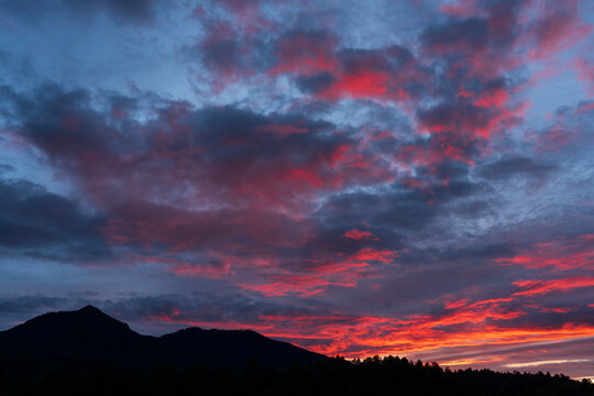 Red clouds at sunset around Paricutin volcano
